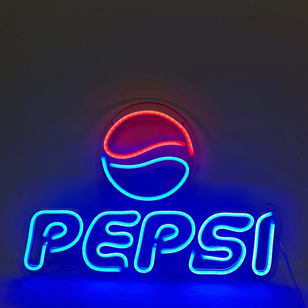 Ferdig Pepsi logo neon tegn glødende i rød og blå